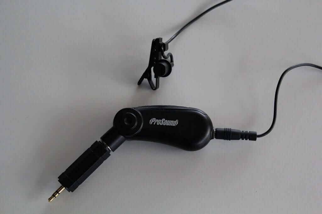 a small microphone in awhite background