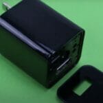 USB spy charger camera in a green backgroud