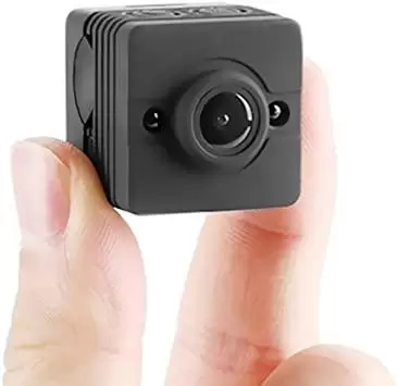 hand holding spy camera