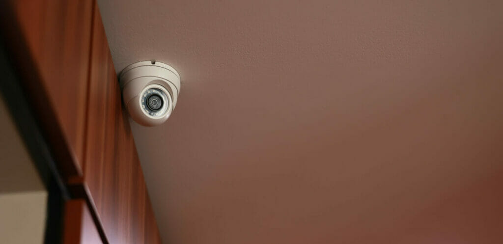 a dome-like cctv camera installed at the indoor ceiling of a home