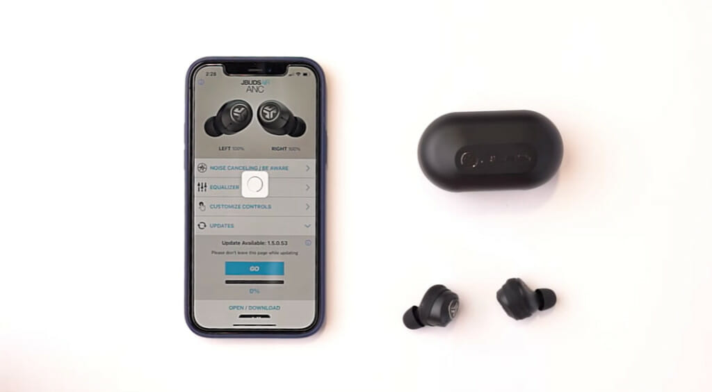 a top shot of an earbud set and phone showing the earbud's app