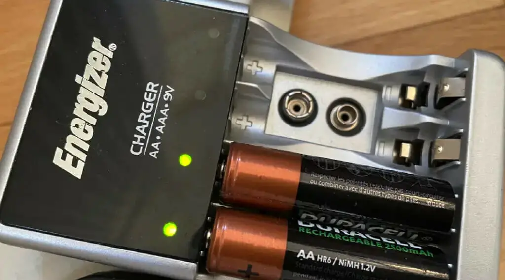 energizer charger with two duracell double A battery