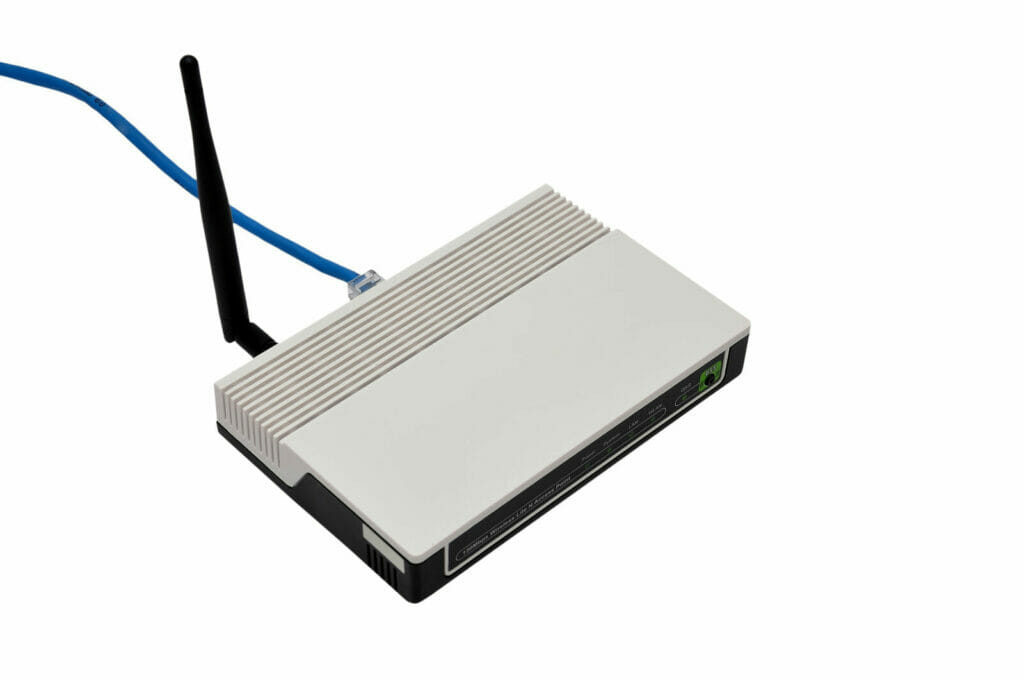 wireless router with blue ethernet cable attached to the LAN slot
