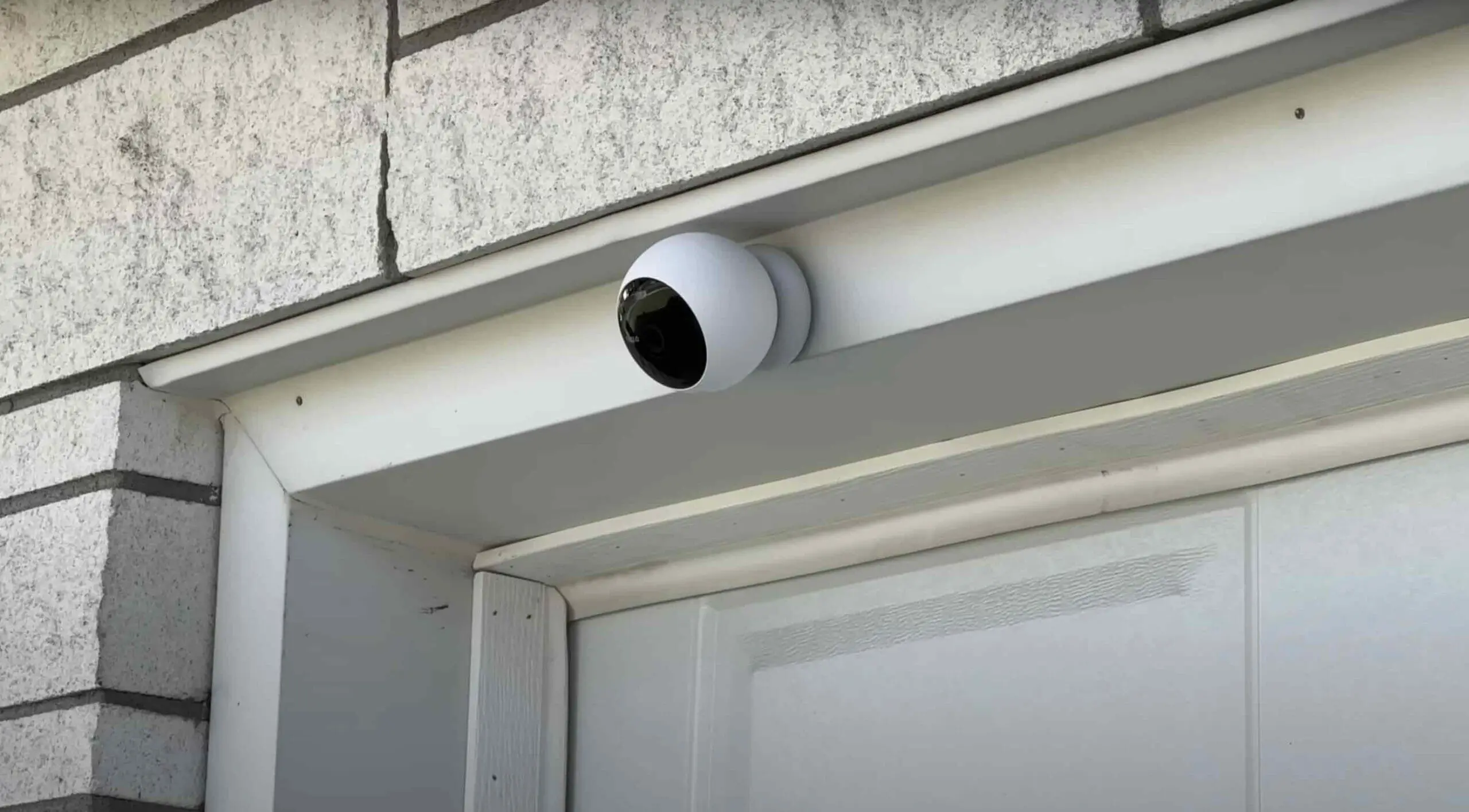 wireless security camera mounted in an outdoor window