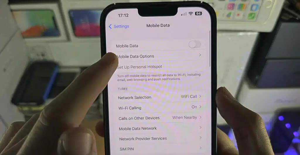 a hand tapping on a Cellular Data Options or Mobile Data Options