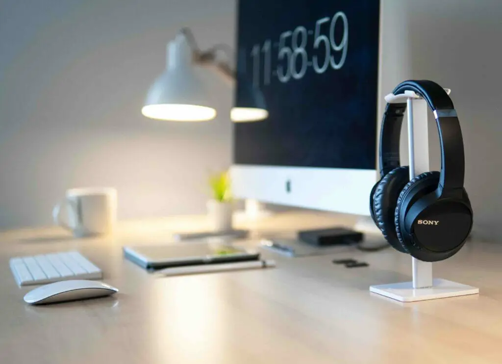 a workstation with sony headphone on a headphone holder