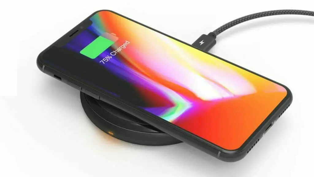 iPhone XR charging on a wireless charger