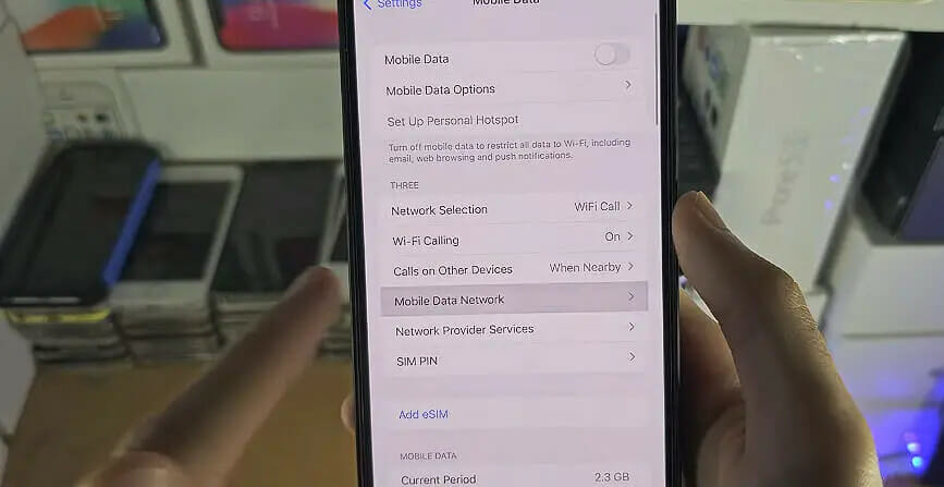 tapping on the mobile data network option on the setting