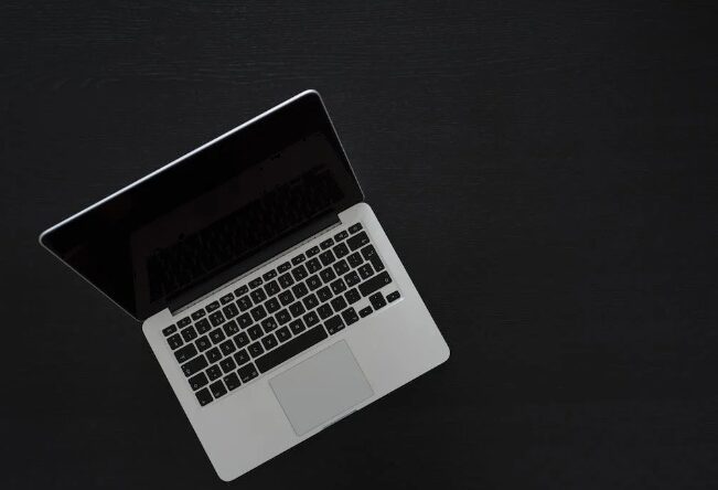 An image of a laptop on a black background