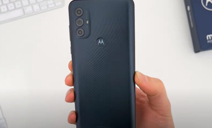 A person holding a Motorola phone