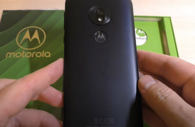 A person holding a Motorola phone