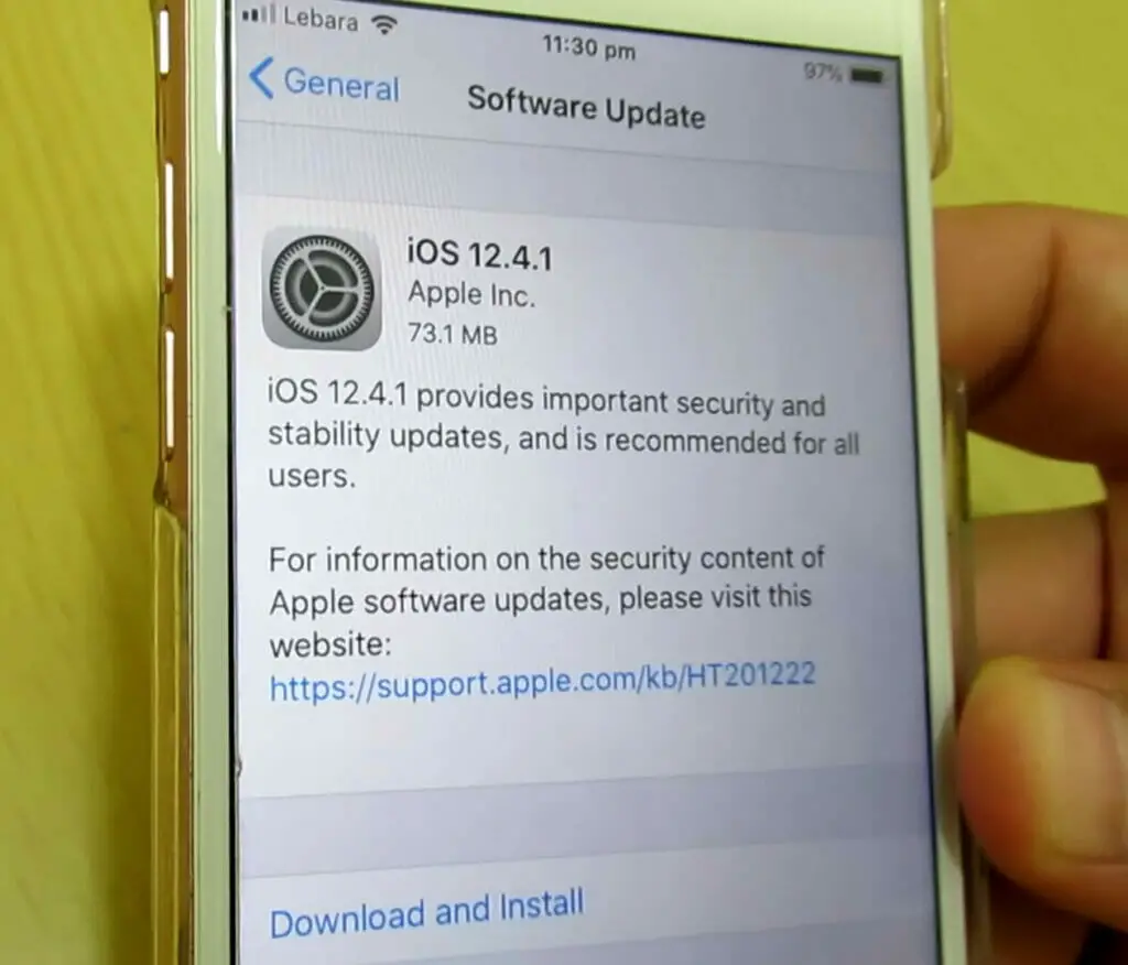 A person showing an iOS software update setting