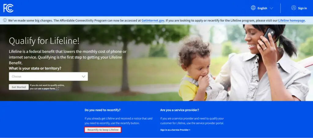 A web page with banner of a Mom on the phone holding her child