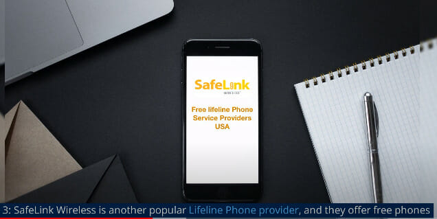 A phone with safelink logo showing on the screen besides it is a notebook and pen, a laptop and a brown and black envelope