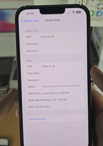 A person showing the Mobile Data settings on an iphone