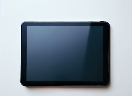 A tablet computer with a blank screen on a white background