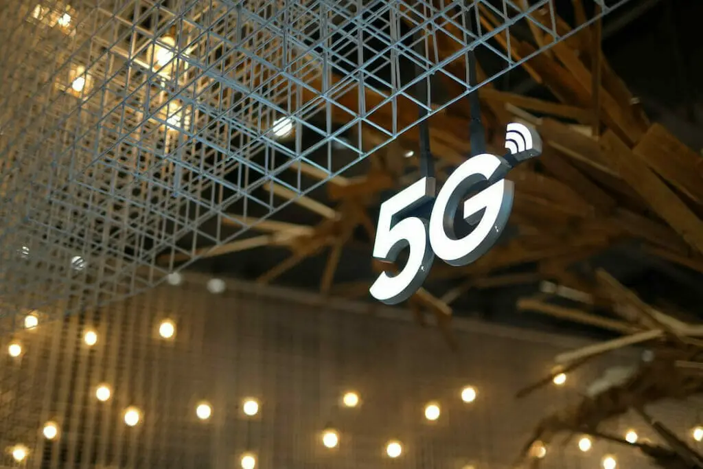 A 5G LED sign hanging from a ceiling