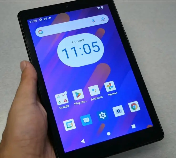 A person holding a MOXEE Tablet 2