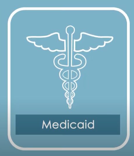 Medicaid logo on a blue/green background