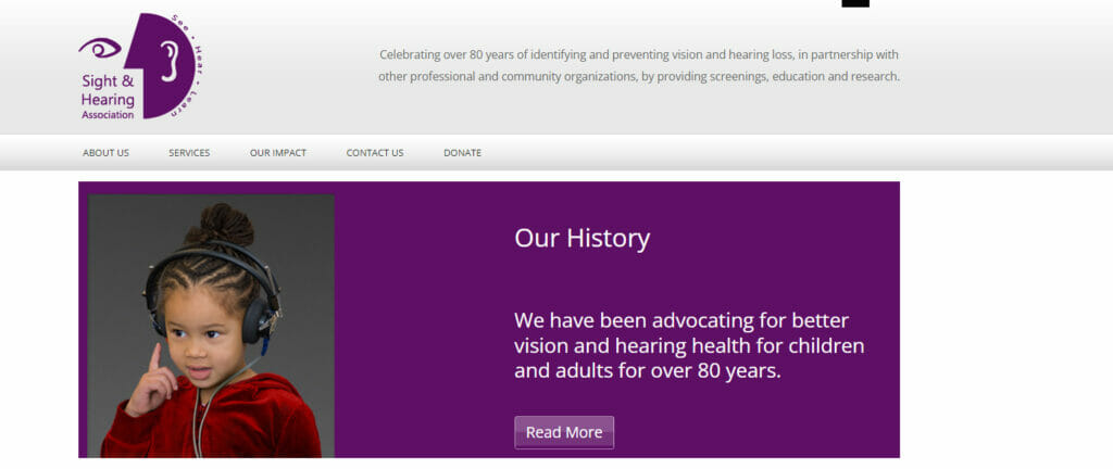 Sight and Hearing Association website with a child on headset in its Our History banner