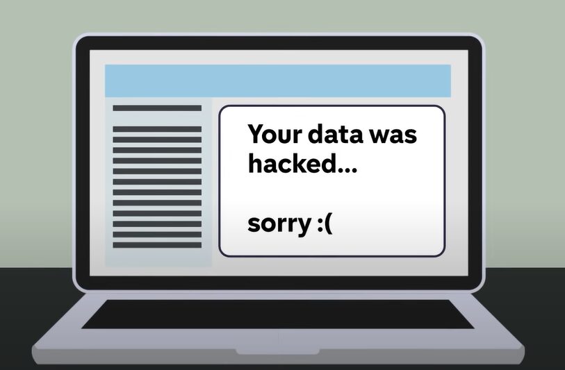 An illustration with a laptop and a text: Your data was hacked... sorry